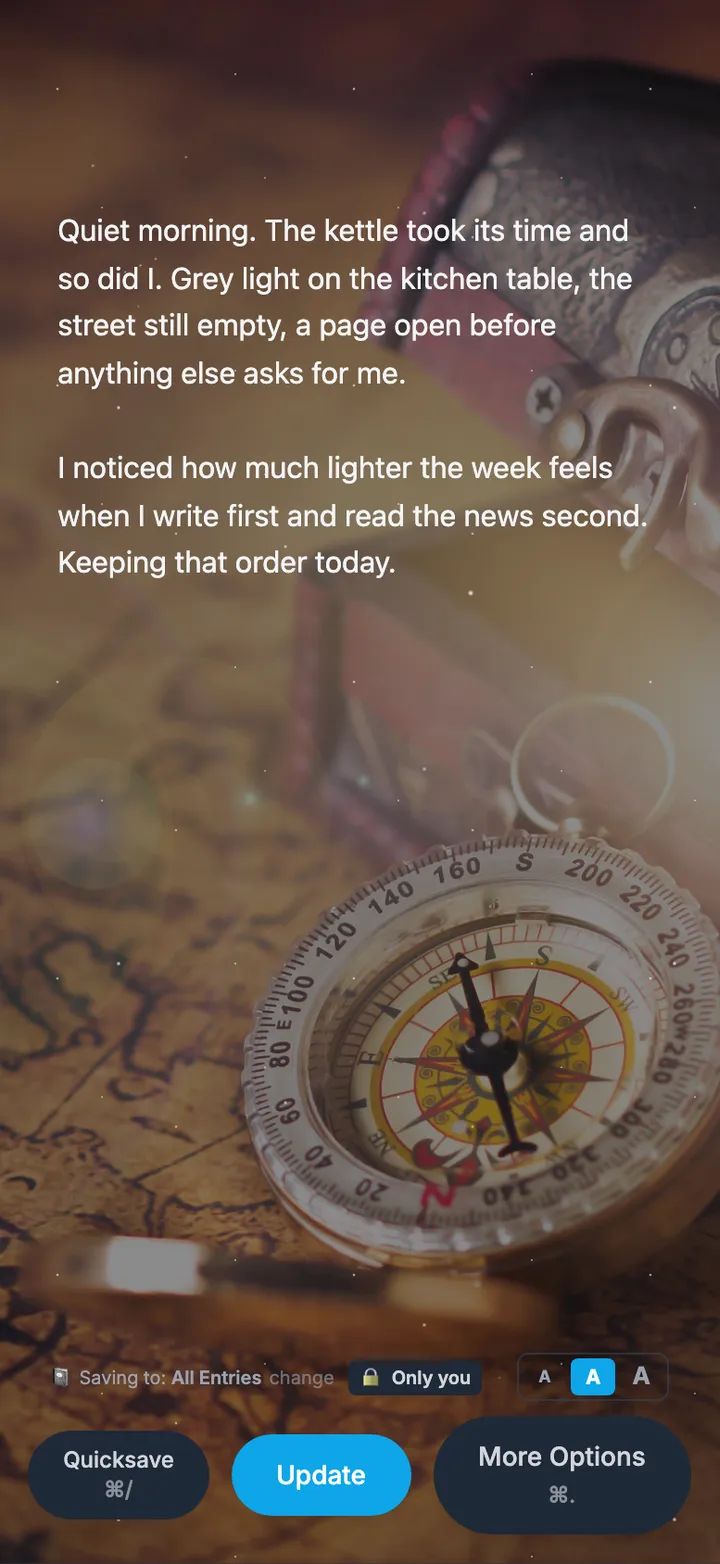 The web writing page in dark mode: the same quiet-morning paragraphs in white over a photograph of a brass compass on an old map, with the save bar along the bottom